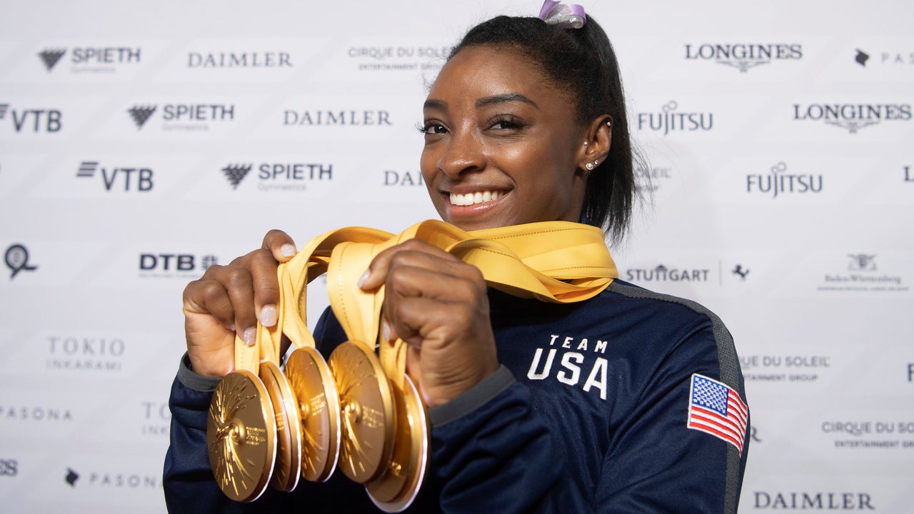 After record world medal haul, Biles a face of 2020 Olympics